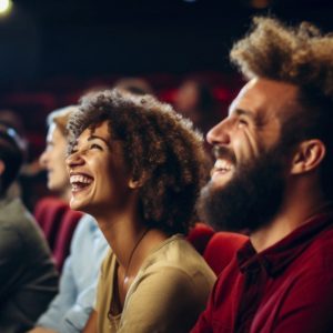 Laughing, smiling guests enjoying a comedy show. Goodfella's hosts comedy shows.